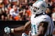 CLEVELAND, OH - SEPTEMBER 08: Defensive end Cameron Wake #91 of the Miami Dolphins celebrates after sacking quarterback Brandon Weeden #3 of the Cleveland Browns at Cleveland Browns Stadium on September 8, 2013 in Cleveland, Ohio. (Photo by Matt Sullivan/