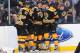 BOSTON, MA - NOVEMBER 5: Chris Kelly #23, Torey Krug #47, Reilly Smith #18, and Carl Soderberg #34 of the Boston Bruins celebrate a goal against the Dallas Stars at the TD Garden on November 5, 2013 in Boston, Massachusetts. (Photo by Steve Babineau/NHLI