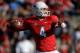 FRESNO, CA - NOVEMBER 23: Derek Carr #4 of the Fresno State Bulldogs drops back to pass against the New Mexico Lobos during the first quarter at Bulldog Stadium on November 23, 2013 in Fresno, California. (Photo by Thearon W. Henderson/Getty Images)