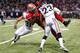 ST LOUIS, MO - SEPTEMBER 26: Anquan Boldin #81 of the San Francisco 49ers is tackled by Cortland Finnegan #31 and Rodney McLeod #23 of the St. Louis Rams in the second quarter at Edward Jones Dome on September 26, 2013 in St Louis, Missouri. (Photo by