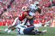 MADISON, WI - NOVEMBER 09: Adam Hone #28 of the BYU Cougars runs with the football before getting tackled by Chris Borland #44 of the Wisconsin Badgers during the first half at Camp Randall Stadium on November 09, 2013 in Madison, Wisconsin. (Photo by Mik