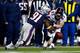 FOXBORO, MA - NOVEMBER 24: Wide receiver Wes Welker #83 of the Denver Broncos cannot hold onto the ball as outside linebacker Jamie Collins #91 of the New England Patriots defends during a game at Gillette Stadium on November 24, 2013 in Foxboro, Massachu