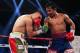 MACAU - NOVEMBER 24: Manny Pacquiao (R) of the Philippines punches Brandon Rios of the U.S. during their 'Clash in Cotai' WBO International Welterweight title fight on November 24, 2013 in Macau. (Photo by Nicky Loh/Getty Images)