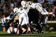 The Hurricanes defense gave up 1,609 yards and 131 points during a three-game losing streak in November.