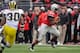 COLUMBUS, OH - NOVEMBER 24: Carlos Hyde #34 of the Ohio State Buckeyes runs with the ball against the Michigan Wolverines at Ohio Stadium on November 24, 2012 in Columbus, Ohio. (Photo by Jamie Sabau/Getty Images)