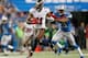 DETROIT, MI - NOVEMBER 24: Tiquan Underwood #11 of the Tampa Bay Buccaneers catches a touchdown pass in front of Chris Houston #23 of the Detroit Lions in the fourth quarter at Ford Field on November 24, 2013 in Detroit, Michigan. (Photo by Gregory Shamus