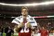TUSCALOOSA, AL - NOVEMBER 24: AJ McCarron #10 of the Alabama Crimson Tide runs onto the field after their 49-0 win over the Auburn Tigers at Bryant-Denny Stadium on November 24, 2012 in Tuscaloosa, Alabama. (Photo by Kevin C. Cox/Getty Images)