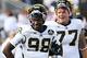 #98 Devin Gardner and #77 Taylor Lewan