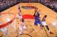 PORTLAND, OR - NOVEMBER 25: Carmelo Anthony #7 of the New York Knicks shoots against the Portland Trail Blazers on November 25, 2013 at the Moda Center Arena in Portland, Oregon. NOTE TO USER: User expressly acknowledges and agrees that, by downloading an