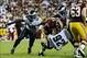 Sep 9, 2013; Landover, MD, USA; Washington Redskins quarterback Robert Griffin III (10) is sacked by Philadelphia Eagles cornerback Cary Williams (26) during the first half at FedEX Field. Mandatory Credit: Brad Mills-USA TODAY Sports