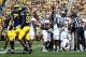 ANN ARBOR, MI - SEPTEMBER 14: Jamel Turner #55 of the Akron Zips celebrates recovering a second quarter fumble by Devin Gardner #98 of the Michigan Wolverines during the second quarter at Michigan Stadium on September 14, 2013 in Ann Arbor, Michigan. (Ph