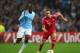 MANCHESTER, ENGLAND - OCTOBER 02: Franck Ribery of Muenchen takes on Yaya Toure of Manchester City during the UEFA Champions League Group D match between Manchester City and FC Bayern Muenchen at Etihad Stadium on October 2, 2013 in Manchester, England.