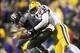 Texas A&M QB Johnny Manziel (left) and LSU DE Jermauria Rasco