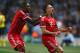 MANCHESTER, ENGLAND - OCTOBER 02: Franck Ribery (R) of Muenchen celebrates scoring the opening goal with David Alaba of Muenchen during the UEFA Champions League Group D match between Manchester City and FC Bayern Muenchen at Etihad Stadium on October 2,