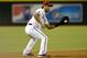 PHOENIX, AZ - SEPTEMBER 17: Eric Chavez #12 of the Arizona Diamondbacks makes a play on a ground ball against the Los Angeles Dodgers at Chase Field on September 17, 2013 in Phoenix, Arizona. (Photo by Norm Hall/Getty Images)