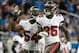 Nov 24, 2013; Detroit, MI, USA; Tampa Bay Buccaneers outside linebacker Lavonte David (54) and safety Kelcie McCray (35) celebrate during the fourth quarter against the Detroit Lions at Ford Field. Tampa Bay won 24-21. Mandatory Credit: Tim Fuller-USA TOD