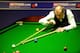 SHEFFIELD, ENGLAND - APRIL 28: Steve Davis of England in action against Neil Robertson of Australia during the Quarter Finals of the Betfred.com World Snooker Championships at The Crucible Theatre on April 28, 2010 in Sheffield, England. (Photo by Laure