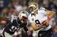 Oct 13, 2013; Foxborough, MA, USA; New England Patriots defensive end Chandler Jones (95) sacks New Orleans Saints quarterback Drew Brees (9) during the fourth quarter at Gillette Stadium. The Patriots defeated the Saints 30-27. Mandatory Credit: Stew Mil