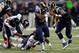 ST. LOUIS, MO - NOVEMBER 24: Benny Cunningham #36 of the St. Louis Rams rushes in the third quarter against the Chicago Bears at the Edward Jones Dome on November 24, 2013 in St. Louis, Missouri. (Photo by Michael Thomas/Getty Images)