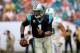 MIAMI GARDENS, FL - NOVEMBER 24: Cam Newton #1 of the Carolina Panthers looks to pass the ball in the second quarter against the Miami Dolphins at Sun Life Stadium on November 24, 2013 in Miami Gardens, Florida. (Photo by Chris Trotman/Getty Images)