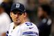 NEW ORLEANS, LA - NOVEMBER 10: Tony Romo #9 of the Dallas Cowboys stands on the sideline during a game against the New Orleans Saints at the Mercedes-Benz Superdome on November 10, 2013 in New Orleans, Louisiana. New Orlerans won the game 49-17. (Photo