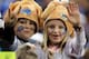 DETROIT, MI - NOVEMBER 24: Two kids, a Detroit Lions fan and a Green Bay Packers fan, cheer on their teams before the Lions take on the Packers during the Thanksgiving Day game at Ford Field on November 24, 2011 in Detroit, Michigan. (Photo by Gregory S