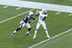 MIAMI GARDENS, FL - NOVEMBER 17: Mike Wallace #11 of the Miami Dolphins catches the ball in front of Shareece Wright #29 of the San Diego Chargers on November 17, 2013 at Sun Life Stadium in Miami Gardens, Florida. (Photo by Joel Auerbach/Getty Images)