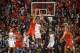 SAN DIEGO, CA - NOVEMBER 14: Aaron Gordon #11 of theArizona Wildcats dunks the ball on an inbounds pass in the second half of the game and is fouled by Dakarai Allen #4 of the San Diego State Aztecs at Viejas Arena on November 14, 2013 in San Diego, Cali