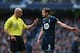 MANCHESTER, ENGLAND - NOVEMBER 24: Jan Vertonghen of Tottenham Hotspur is spoken to by referee Howard Webb during the Barclays Premier League match between Manchester City and Tottenham Hotspur at Etihad Stadium on November 24, 2013 in Manchester, Englan