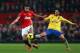 MANCHESTER, ENGLAND - NOVEMBER 10: Robin van Persie of Manchester United competes with Mikel Arteta of Arsenal during the Barclays Premier League match between Manchester United and Arsenal at Old Trafford on November 10, 2013 in Manchester, England. (P