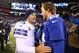 EAST RUTHERFORD, NJ - NOVEMBER 24: Tony Romo #9 of the Dallas Cowboys and Eli Manning #10 of the New York Giants meet after the 24-21 win by the Cowboys at MetLife Stadium on November 24, 2013 in East Rutherford, New Jersey. (Photo by Al Bello/Getty Im