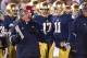 Nov 23, 2013; South Bend, IN, USA; Notre Dame Fighting Irish head coach Brian Kelly talks with quarterback Tommy Rees (11) in the fourth quarter against the BYU Cougars at Notre Dame Stadium. Notre Dame won 23-13. Mandatory Credit: Matt Cashore-USA TODAY
