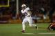 LOS ANGELES, CA - NOVEMBER 16: Running back Tyler Gaffney #25 of the Stanford Cardinal carries the ball against the USC Trojans at Los Angeles Coliseum on November 16, 2013 in Los Angeles, California. (Photo by Jeff Gross/Getty Images)