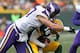 GREEN BAY, WI - NOVEMBER 24: Audie Cole #57 of the Minnesota Vikings sacks Scott Tolzien #16 of the Green Bay Packers at Lambeau Field on November 24, 2013 in Green Bay, Wisconsin. The Vikings and the Packers tied 26-26 after overtime. (Photo by Jonathan