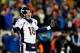 FOXBORO, MA - NOVEMBER 24: Quarterback Peyton Manning #18 of the Denver Broncos reacts against the New England Patriots during a game at Gillette Stadium on November 24, 2013 in Foxboro, Massachusetts. (Photo by Jim Rogash/Getty Images)