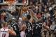 Nov 26, 2013; Toronto, Ontario, CAN; Toronto Raptors forward Rudy Gay (22) is stopped by Brooklyn Nets forward Kevin Garnett (2) and forward Paul Pierce (34) and forward Andray Blatche (0) as he goes up with the ball at Air Canada Centre. The Nets beat th