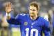 Oct 21, 2013; East Rutherford, NJ, USA; New York Giants quarterback Eli Manning (10) waves to fans leaving the field after victory over Minnesota Vikings at MetLife Stadium. New York Giants defeat the Minnesota Vikings 23-7. Mandatory Credit: Jim O'Conno