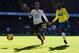 LONDON, ENGLAND - NOVEMBER 10: (L-R) Roberto Soldado of Tottenham Hotspur and Mapou Yanga-Mbiwa of Newcastle United challenge for the ball during the Barclays Premier League match between Tottenham Hotspur and Newcastle United at White Hart Lane on Novem