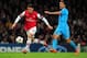 LONDON, ENGLAND - NOVEMBER 26: Mesut Oezil of Arsenal breaks away from Jeremy Morel of Marseille during the UEFA Champions League Group F match between Arsenal and Olympique de Marseille at Emirates Stadium on November 26, 2013 in London, England. (Phot