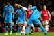 LONDON, ENGLAND - NOVEMBER 26: Olivier Giroud of Arsenal is closed down by Alaixys Romao and Lucas Mendes of Marseille during the UEFA Champions League Group F match between Arsenal and Olympique de Marseille at Emirates Stadium on November 26, 2013 in L