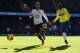 LONDON, ENGLAND - NOVEMBER 10: (L-R) Roberto Soldado of Tottenham Hotspur and Mapou Yanga-Mbiwa of Newcastle United challenge for the ball during the Barclays Premier League match between Tottenham Hotspur and Newcastle United at White Hart Lane on Novem