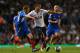 LONDON, ENGLAND - OCTOBER 30: Erik Lamela of Tottenham comes under pressure from Stephen Quinn of Hull during the Capital One Cup Fourth Round match between Tottenham Hotspur and Hull City at White Hart Lane on October 30, 2013 in London, England. (Phot