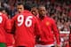 LIVERPOOL, ENGLAND - SEPTEMBER 23: Patrice Evra of Manchester United shakes hands with Luis Suarez of Liverpool before the Barclays Premier League match between Liverpool and Manchester United at Anfield on September 23, 2012 in Liverpool, England. (Pho