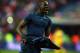 PARIS, FRANCE - NOVEMBER 19: Mamadou Sakho of France celebrates after winning the FIFA 2014 World Cup Qualifier Play-off second leg match between France and Ukraine at the Stade de France on November 19, 2013 in Paris, France. (Photo by Bryn Lennon/Gett