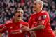 LIVERPOOL, ENGLAND - JANUARY 28: Daniel Agger of Liverpool celebrates scoring the opening goal with Maxi (L) and Martin Skrtel (R) during the FA Cup Fourth Round match between Liverpool and Manchester United at Anfield on January 28, 2012 in Liverpool, E