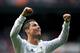 MADRID, SPAIN - NOVEMBER 09: Cristiano Ronaldo of Real Madrid CF celebrates scoring their fifth goal during the La Liga match between Real Madrid CF and Real Sociedad de Futbol at Estadio Santiago Bernabeu on November 9, 2013 in Madrid, Spain. (Photo b