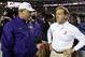 Nov 9, 2013; Tuscaloosa, AL, USA; LSU Tigers head coach Les Miles and Alabama Crimson Tide head coach Nick Saban greet each other midfield before the start of their game at Bryant-Denny Stadium. Mandatory Credit: John David Mercer-USA TODAY Sports
