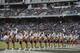 OAKLAND, CA - NOVEMBER 03: The Oakland Raiderettes dance during a timeout between the Philadelphia Eagles and the Oakland Raiders in the fourth quarter on November 3, 2013 at O.co Coliseum in Oakland, California. The Eagles won 49-20. (Photo by Brian Ba
