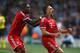 MANCHESTER, ENGLAND - OCTOBER 02: Franck Ribery (R) of Muenchen celebrates scoring the opening goal with David Alaba of Muenchen during the UEFA Champions League Group D match between Manchester City and FC Bayern Muenchen at Etihad Stadium on October 2,