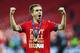 LONDON, ENGLAND - MAY 25: Philipp Lahm of Bayern Muenchen celebrates victory after the UEFA Champions League final match between Borussia Dortmund and FC Bayern Muenchen at Wembley Stadium on May 25, 2013 in London, United Kingdom. (Photo by Alex Grimm/